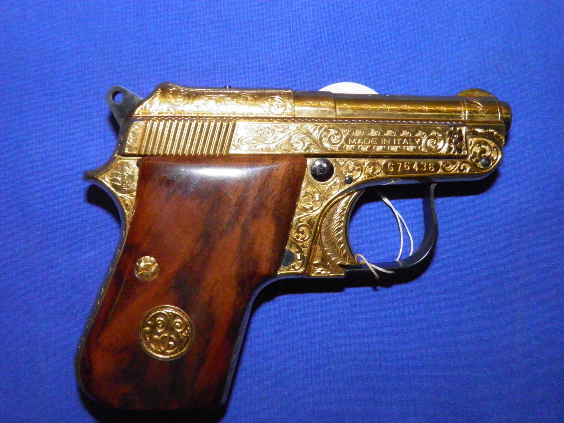 Taschenpistole P. BERRETTA Modell 950 - B 6,35 in Goldausführung – Bild 1