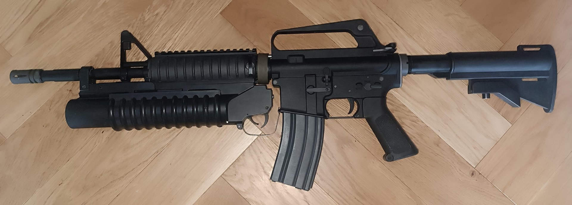 WE M4 / M203 GasBlow Back - schwarz / 2 Magazine – Bild 1