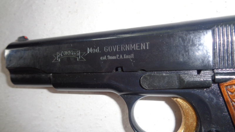 IWG Mod.Governement, Kaliber 9mm P.A.K. schwarz brüniert, Griffschalen mit Figuren, Abzug und Hahn g – Bild 6