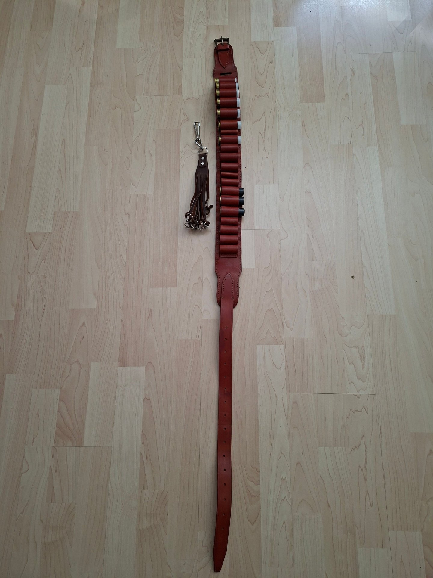 Patronengürtel Leder (mit Federwildschlinge) Kal. 12 – Bild 1