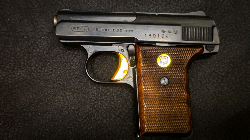 Reck P8 | 6,35 mm Browning | Holzgriffschalen | Originalbox | Lauf spiegelblank | Taschenpistole – stampa 2