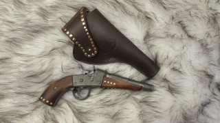 REMINGTON ROLLINGBLOCK PISTOLE REPLICA DEKO MIT HOLSTER MOUNTAIN MEN / INDIANER