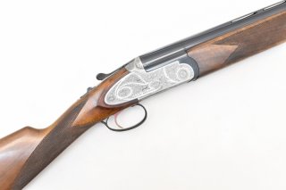 KETTNER " TURIN " Bockflinte Kal. 12/70 mit Seitenplatten, Einabzug, Ejektor und 1/2 - 1/1 Choke