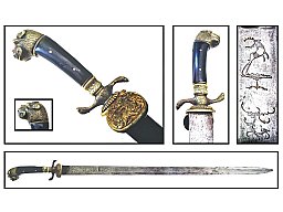 Langer Hirschfänger mit Löwenkopf
