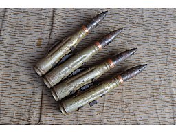 4x 23mm Exerzierpatronen gegurtet Shilka Flak