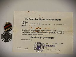 Original Frontkämpferabzeichen / Hindenburgkreuz mit Verleihungsurkunde 1935