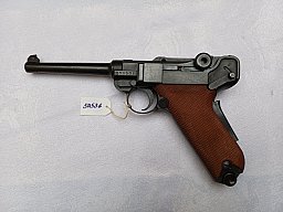 Schweizer Ordonnanzpistole W+F 06/29 mit roten Canevasit Griffschalen