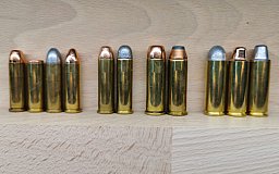 Set Revolver Patronen, 11 Stück, verschiedene Geschosse, Deko-Patrone