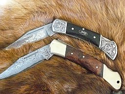Ein Paar wunderschöne Herbertz Damast Taschenmesser