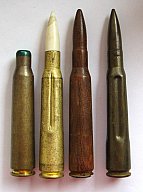 4 Stück Russische / NVA 12,7mm Patronen Deko für DSchK-MG