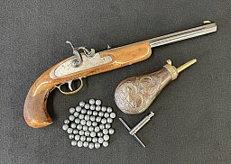 Vorderlader-Pistole Neumann-Pedersoli mit Zubehör