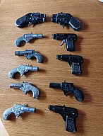 Sammlung von 11 Knallkorkenpistolen